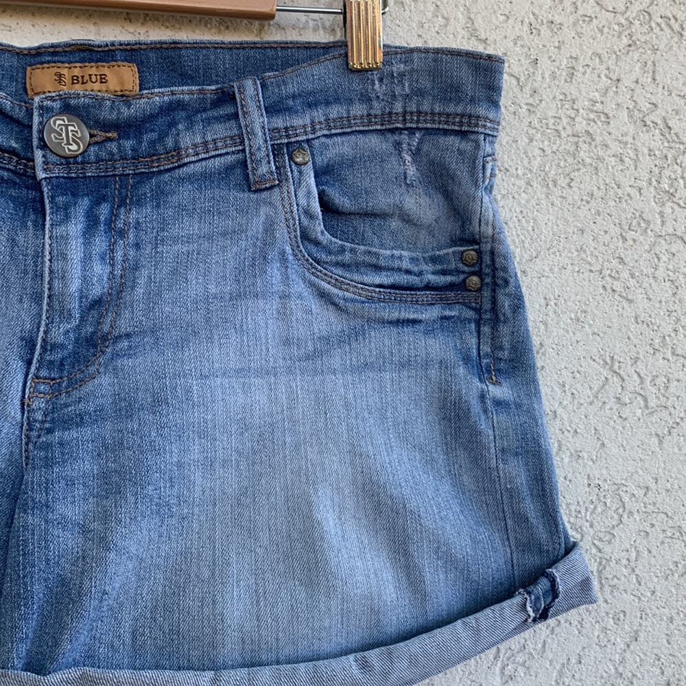 STS. Denim shorts. Faded. Slightly distressed. Jorts